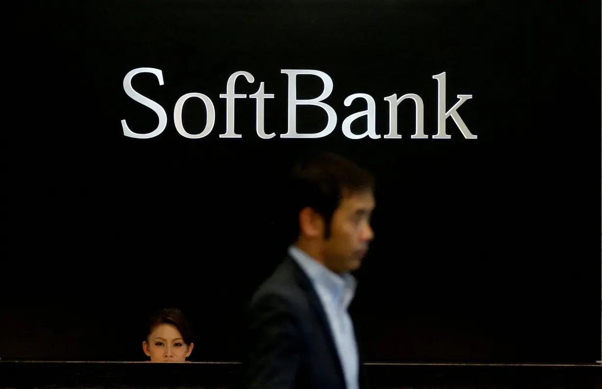 FILE PHOTO: FILE PHOTO: Logo of SoftBank Group Corp is seen at the company's headquarters in Tokyo