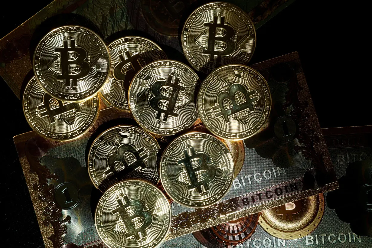 FILE PHOTO: Illustration shows representations of cryptocurrency Bitcoin