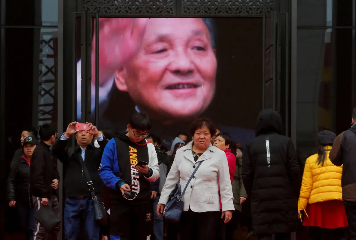 FILE PHOTO: Exhibition marking 40th anniversary of China's reform and opening up