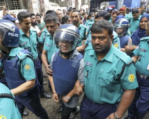 Bangladesh court sends 2 journalists to police custody for questioning as chaos continues