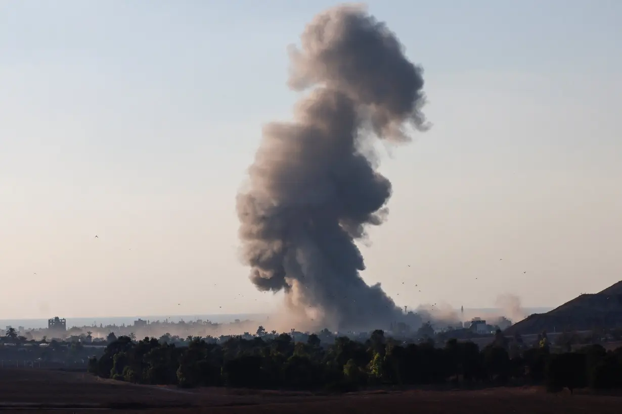 Smoke rises from an explosion in Gaza, near the Israel-Gaza border