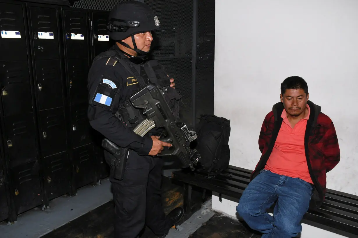 FILE PHOTO: Guatemalan law enforcement arrested Rigoberto Ramon Miranda Orozco, who is charged in the U.S. with conspiring to smuggle four migrants, in Guatemala City