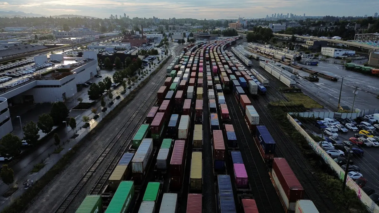 A freight train and box cars sit idle in Vancouver area