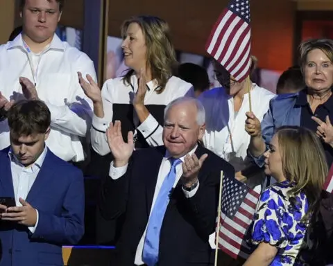 'That’s my dad!': Gus Walz tearfully cheers on his father as he accepts Democratic VP nomination