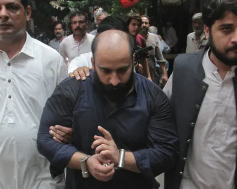 Pakistan man charged with cybercrime linked to riots in Britain