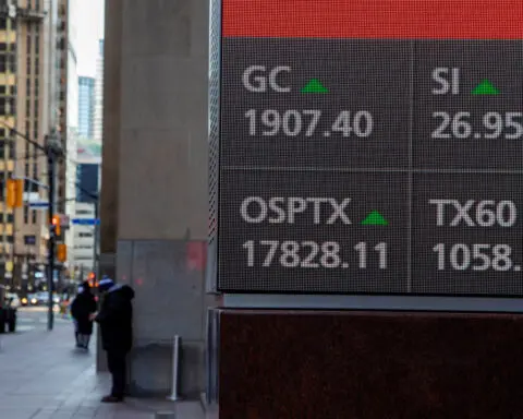 TSX hits record high as Fed chief signs off on rate cuts