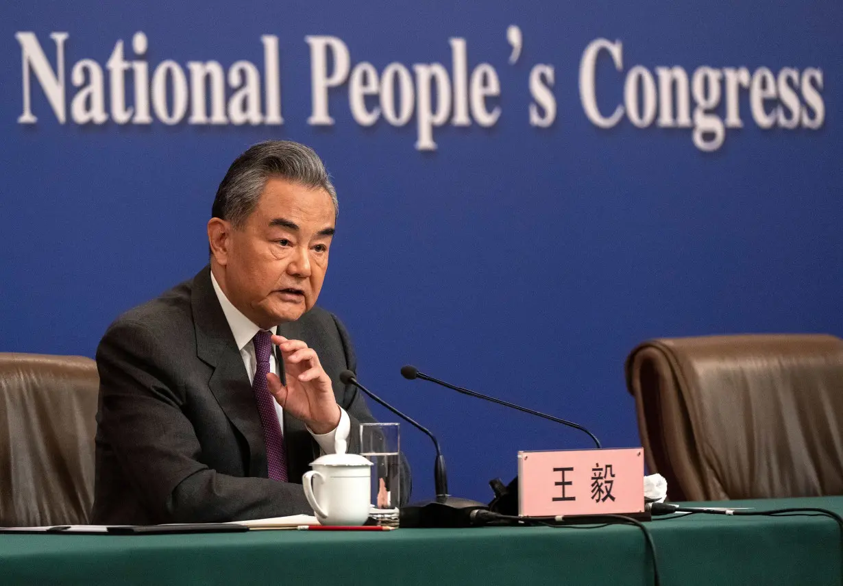 Chinese Foreign Minister Wang Yi speaks during a press conference for domestic and foreign journalists as part of the National People's Congress and Two Sessions on March 7, in Beijing.