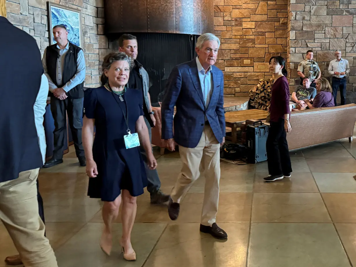 Federal Reserve Chair Jerome Powell heads into the opening dinner at the Kansas City Fed's annual economic symposium in Jackson Hole