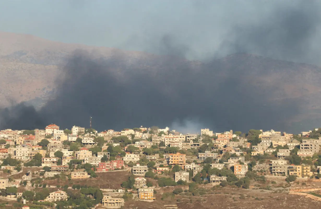 Smoke rises from Khiam, amid cross-border hostilities between Hezbollah and Israeli forces, as pictured from Marjayoun