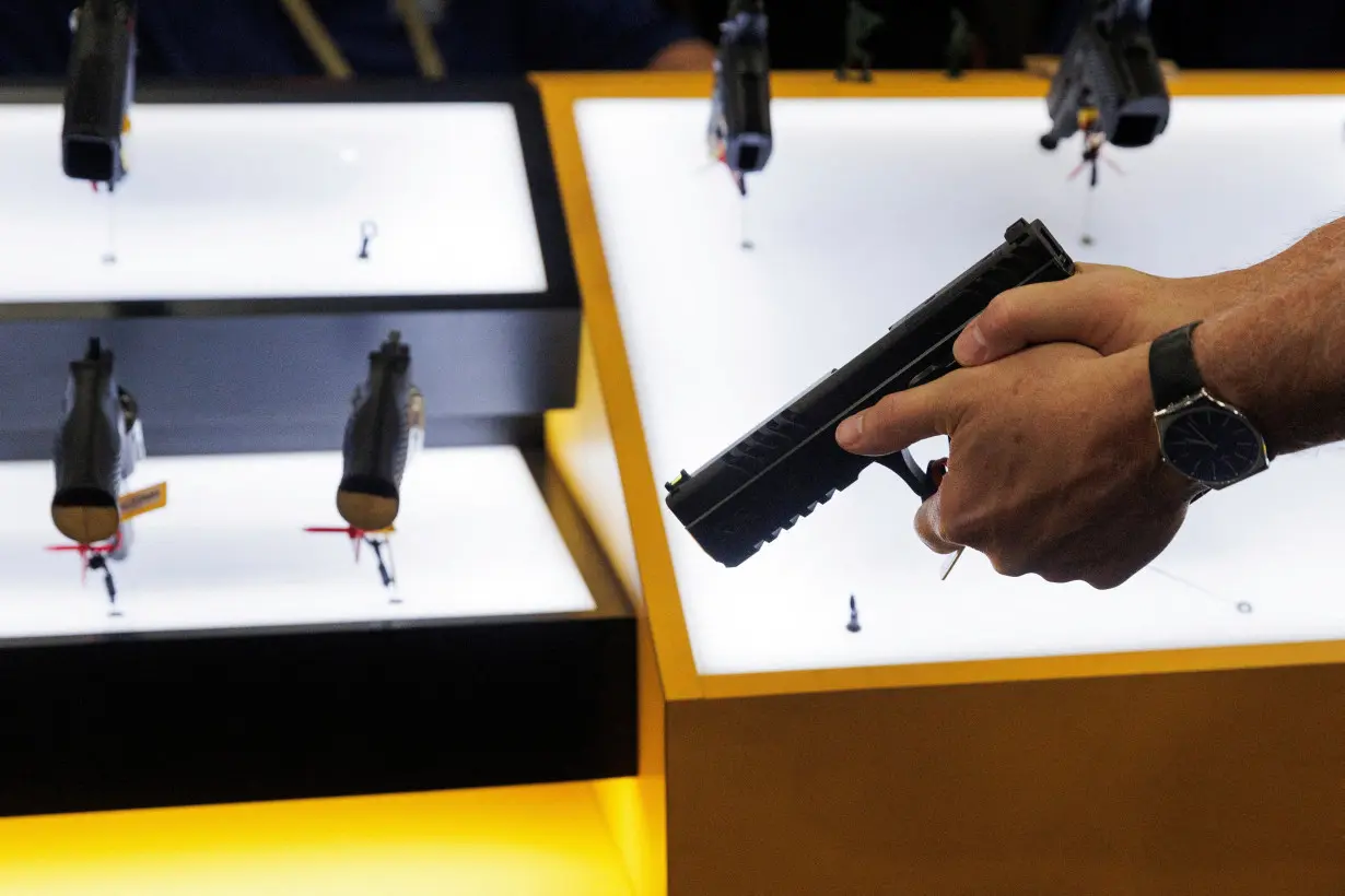 FILE PHOTO: Handguns are shown at NRA annual meeting in Texas