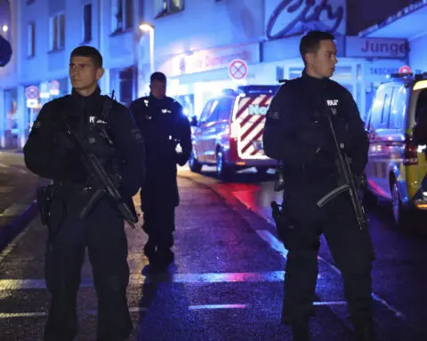 An attack at a festival in a German city kills 3 people and seriously wounds at least 5