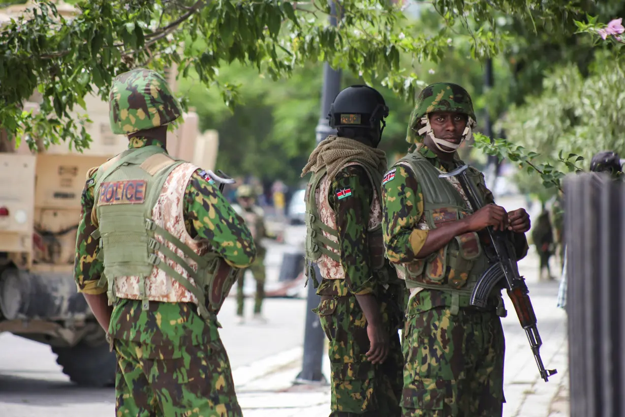 Kenyan and Haitian police patrol in Port-au-Prince