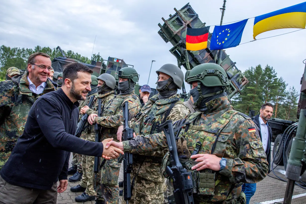 FILE PHOTO: Ukrainian President Volodymyr Zelenskiy visit to a military training area