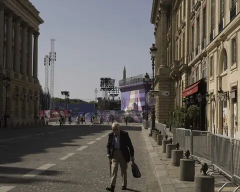 Preparing for the Paralympics, Paris reminds residents and visitors that 'game is not over'