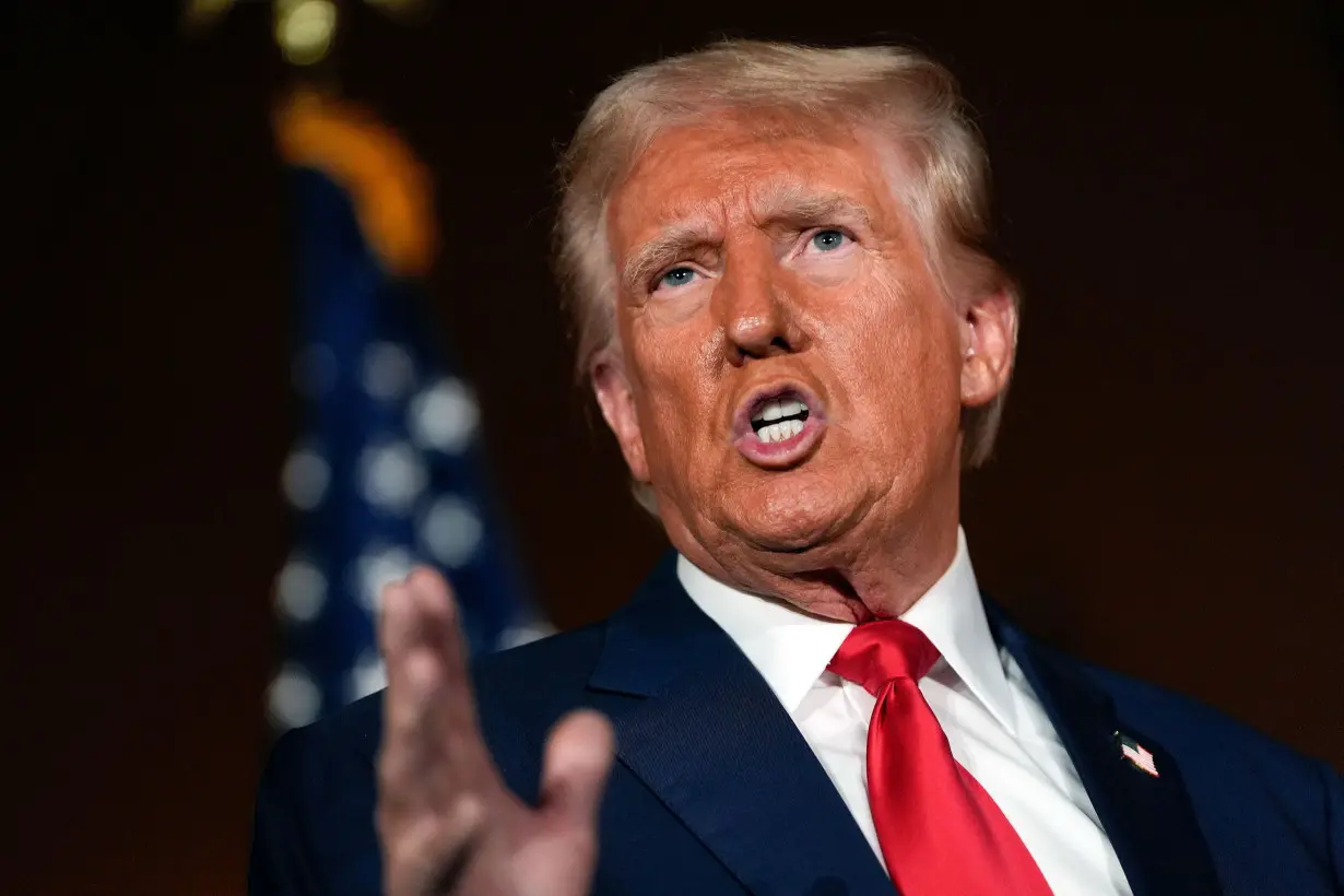 Former President Donald Trump talks with reporters in Las Vegas campaign event at ll Toro E La Capra, on August 23.