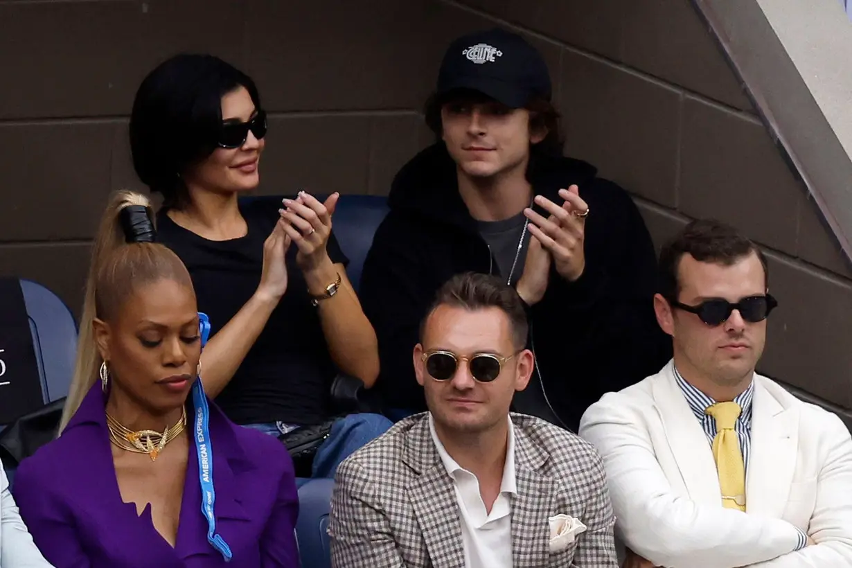 In this undated photo, Kylie Jenner and Timothée Chalamet sit in an outdoor balcony at a suite at Arthur Ashe Stadium in Queens, New York.