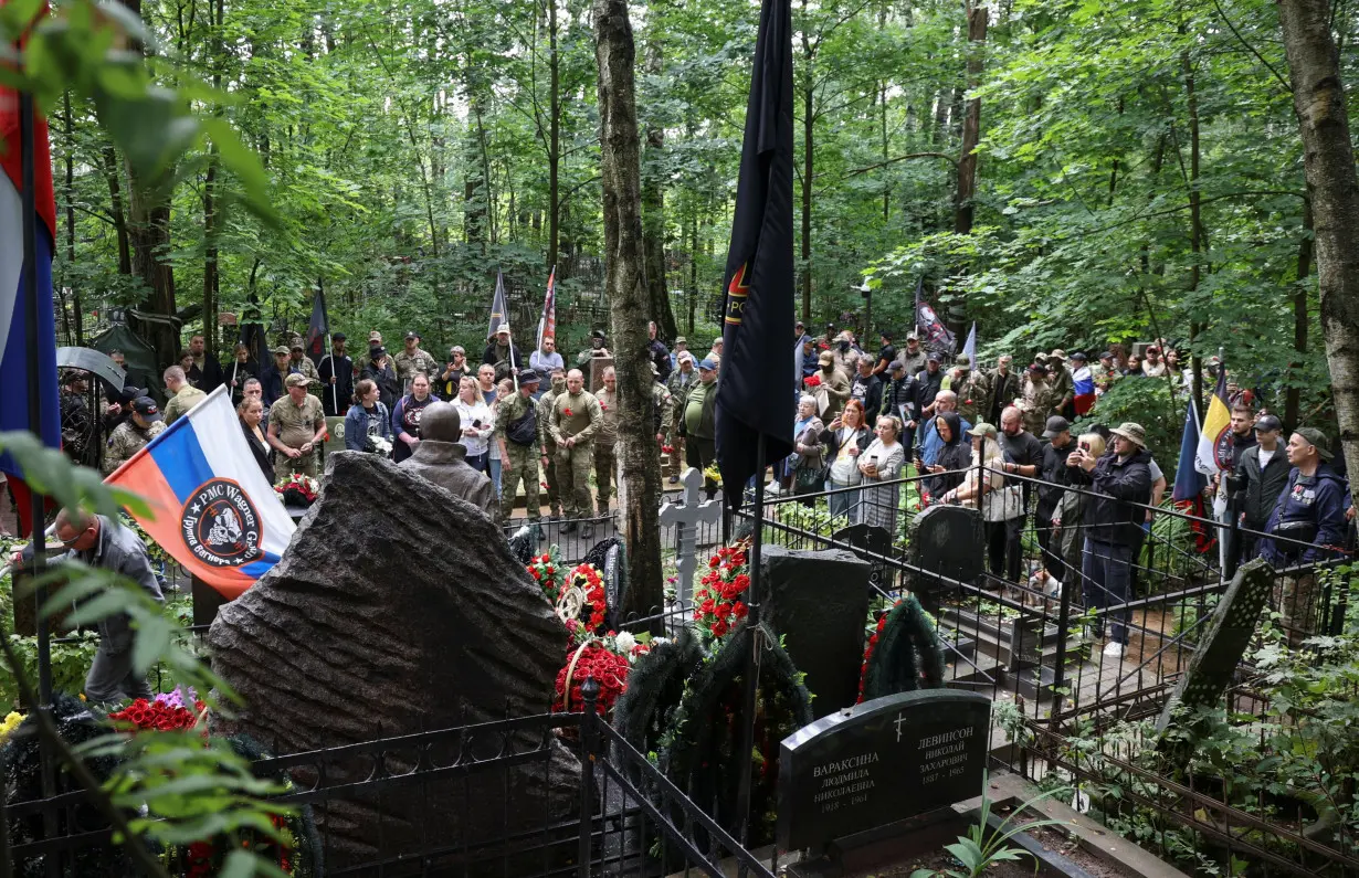 People visit the grave of Wagner chief Prigozhin in St Petersburg