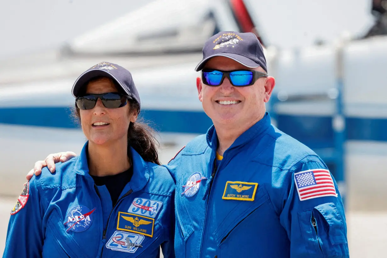 FILE PHOTO: NASA astronauts arrive ahead of the launch of Boeing's Starliner-1 Crew Flight Test (CFT) in Cape Canaveral