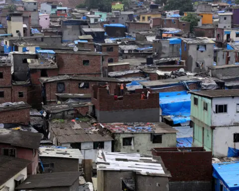 Billionaire Adani's Mumbai slum revamp struggles to secure land in potential setback