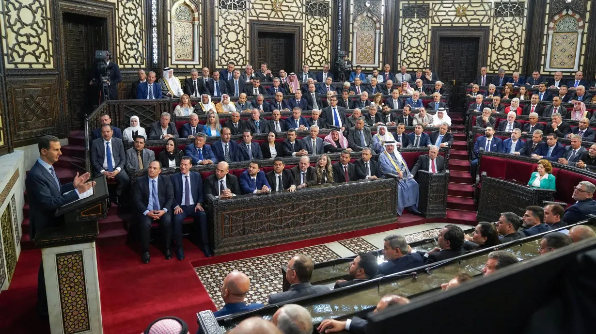 Syria's President Bashar al-Assad speaks to the Syrian parliament in Damascus