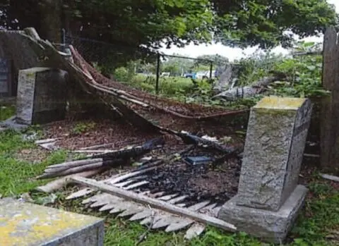 Headstone toppled, fire damage reported at cemetery