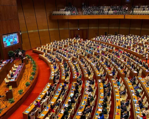 Vietnam replaces more top figures, to elect new president in October
