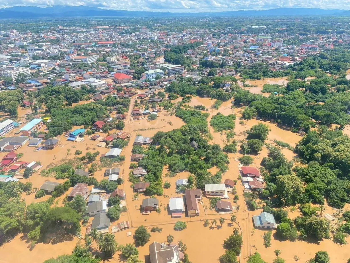 Local Thai authorities distribute aid to flooded areas of Phrae Province