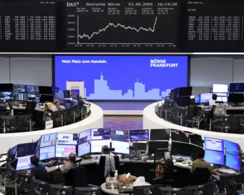 Chip stocks slip, keeping European shares muted ahead of data-heavy week