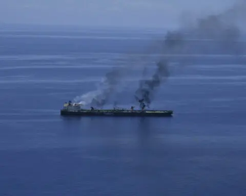 Greek-flagged tanker is burning after Houthi attacks, but no sign of oil spill