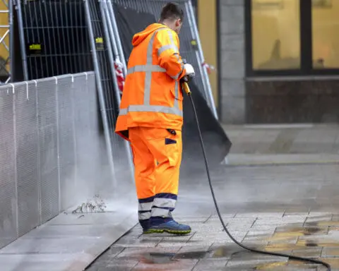 German leader vows tougher knife laws and more deportations after fatal attack in Solingen