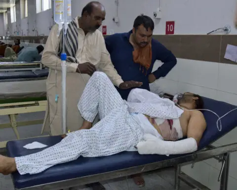 Gunmen kill dozens in multiple attacks in one of the deadliest days in a Pakistani province