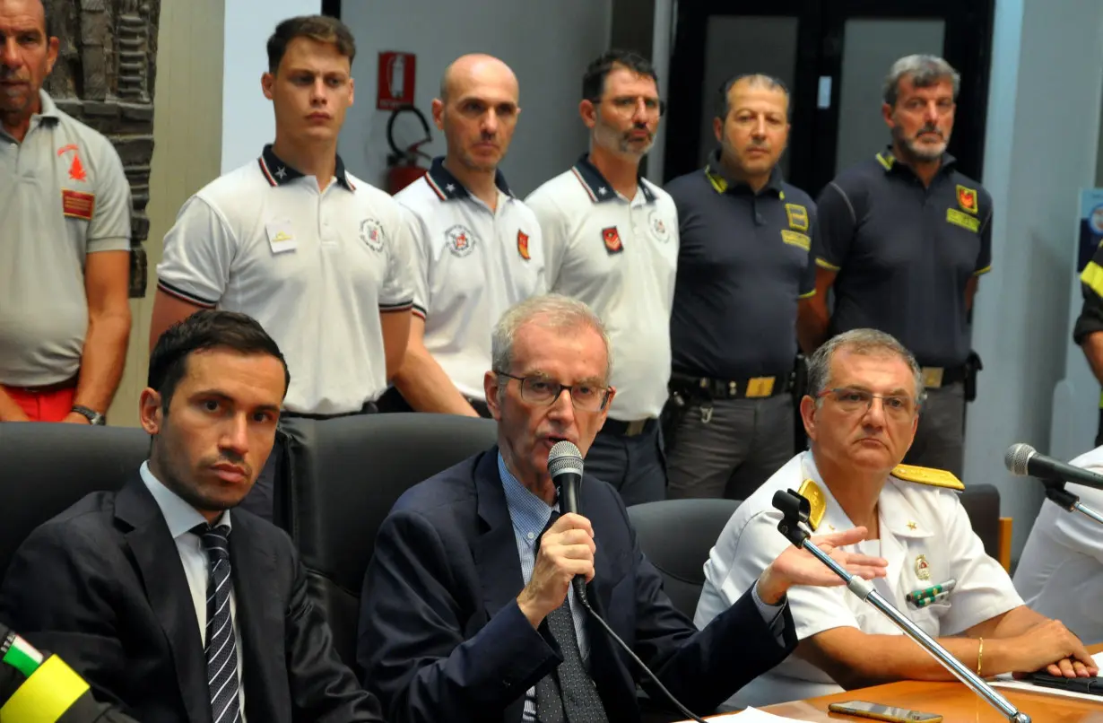 Italian prosecutors speak on August 24, in Sicily, southern Italy. They announced an investigation into negligent shipwreck and manslaughter, over the sinking of the Bayesian yacht that killed seven people.