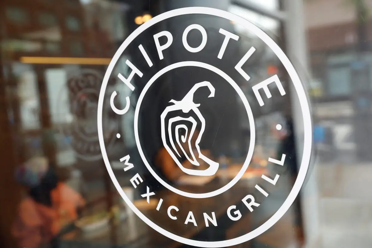 FILE PHOTO: The logo of Chipotle Mexican Grill is seen at the Chipotle Next Kitchen in Manhattan