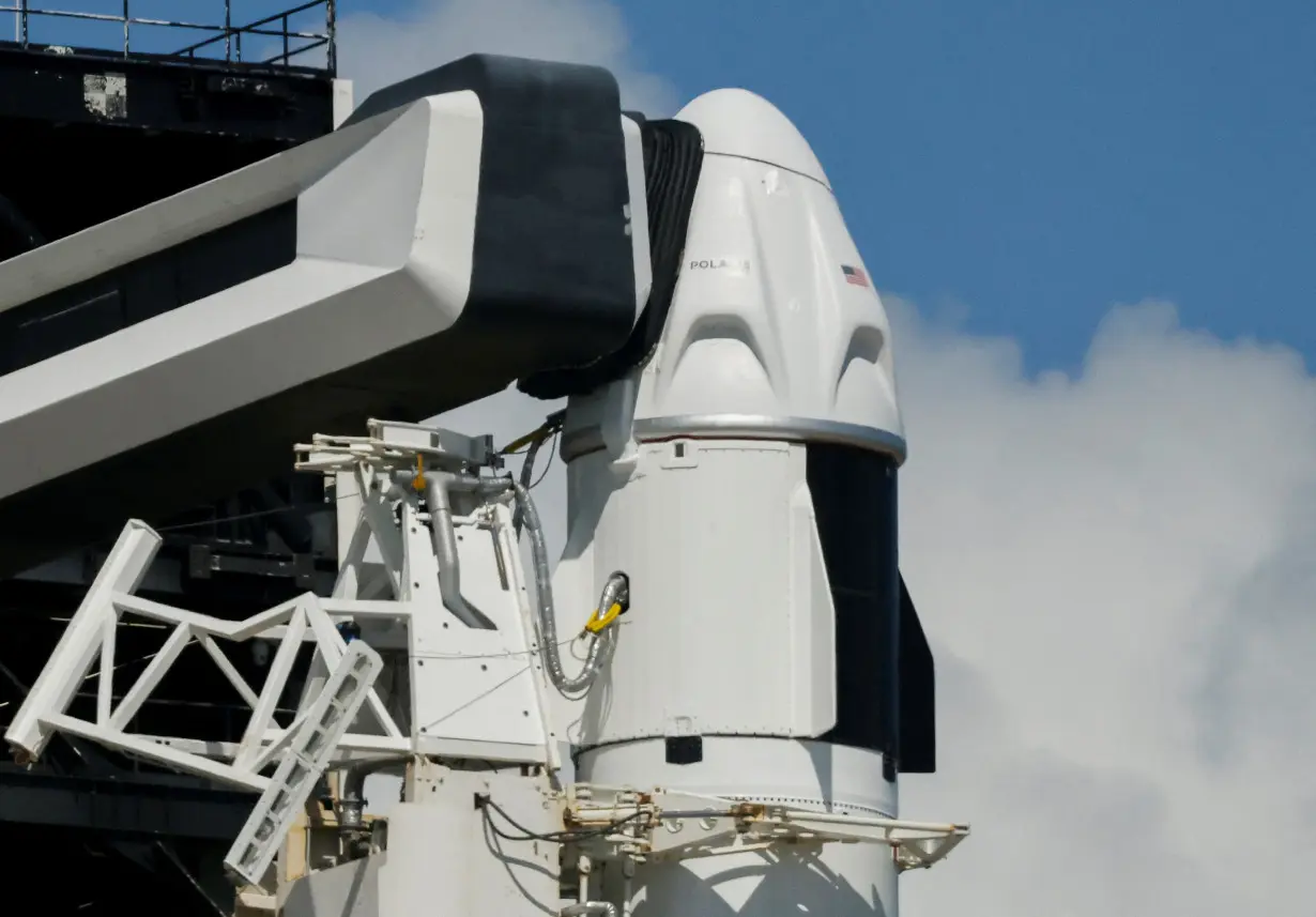 A SpaceX Falcon 9 rocket is prepared for launch of Polaris Dawn, a private human spaceflight mission, at the Kennedy Space Center in Cape Canaveral