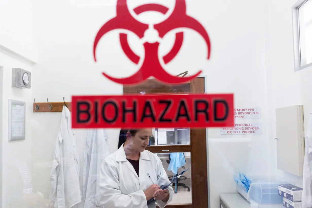 FILE PHOTO: Dr. Jacqueline Weyer, head of Center for Emerging Zoonotic and Parasitic Diseases, stands inside a general diagnostic laboratory at the The National Institute For Communicable Diseases Of South Africa (NICD), in Johannesburg