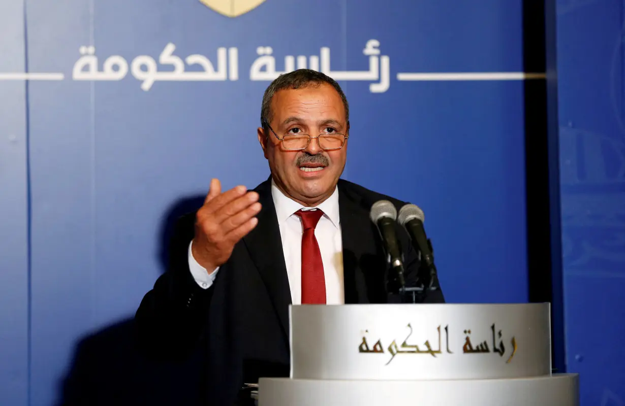 FILE PHOTO: Tunisian Health Minister Abdellatif el-Mekki speaks at a news conference in Tunis