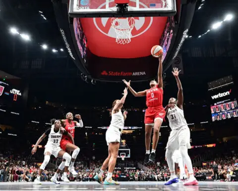 Caitlin Clark makes more WNBA history in front of a record crowd as Indiana Fever down Atlanta Dream