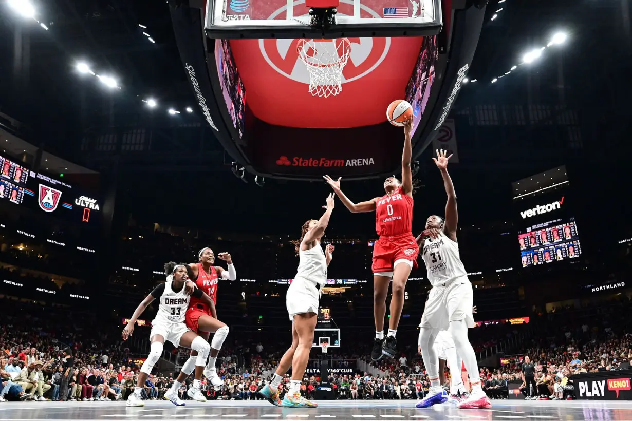 Kelsey Mitchell drives to the basket during the game.