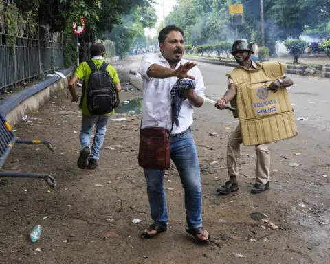 Indian police fire tear gas and water cannons at rally against rape and killing of trainee doctor
