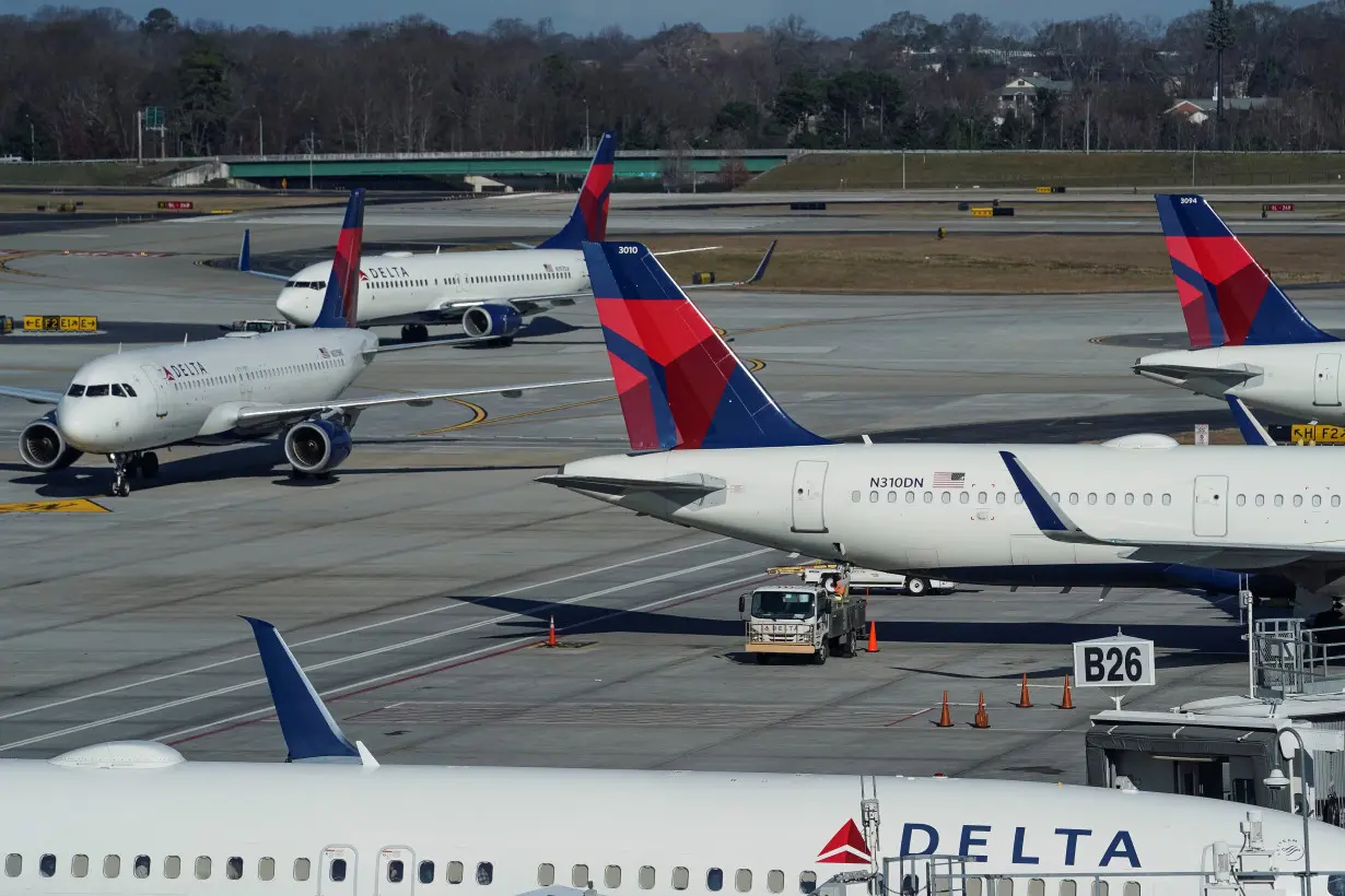 FILE PHOTO: Delta Air Lines jets are seen on a taxiway at Hartsfield-Jackson Atlanta International Airport