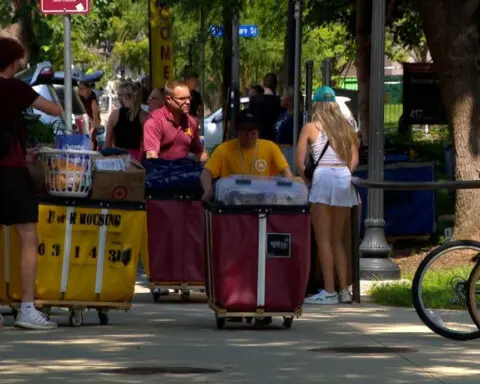 Minnesota college students move-in during one of the hottest days of the year