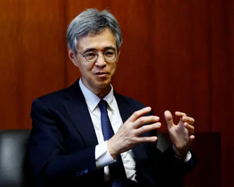 BOJ's Himino reiterates readiness to raise rates if economy on track