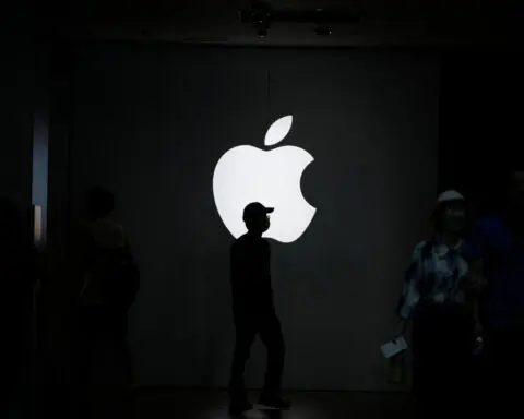 Apple cuts about 100 digital services jobs, Bloomberg News reports