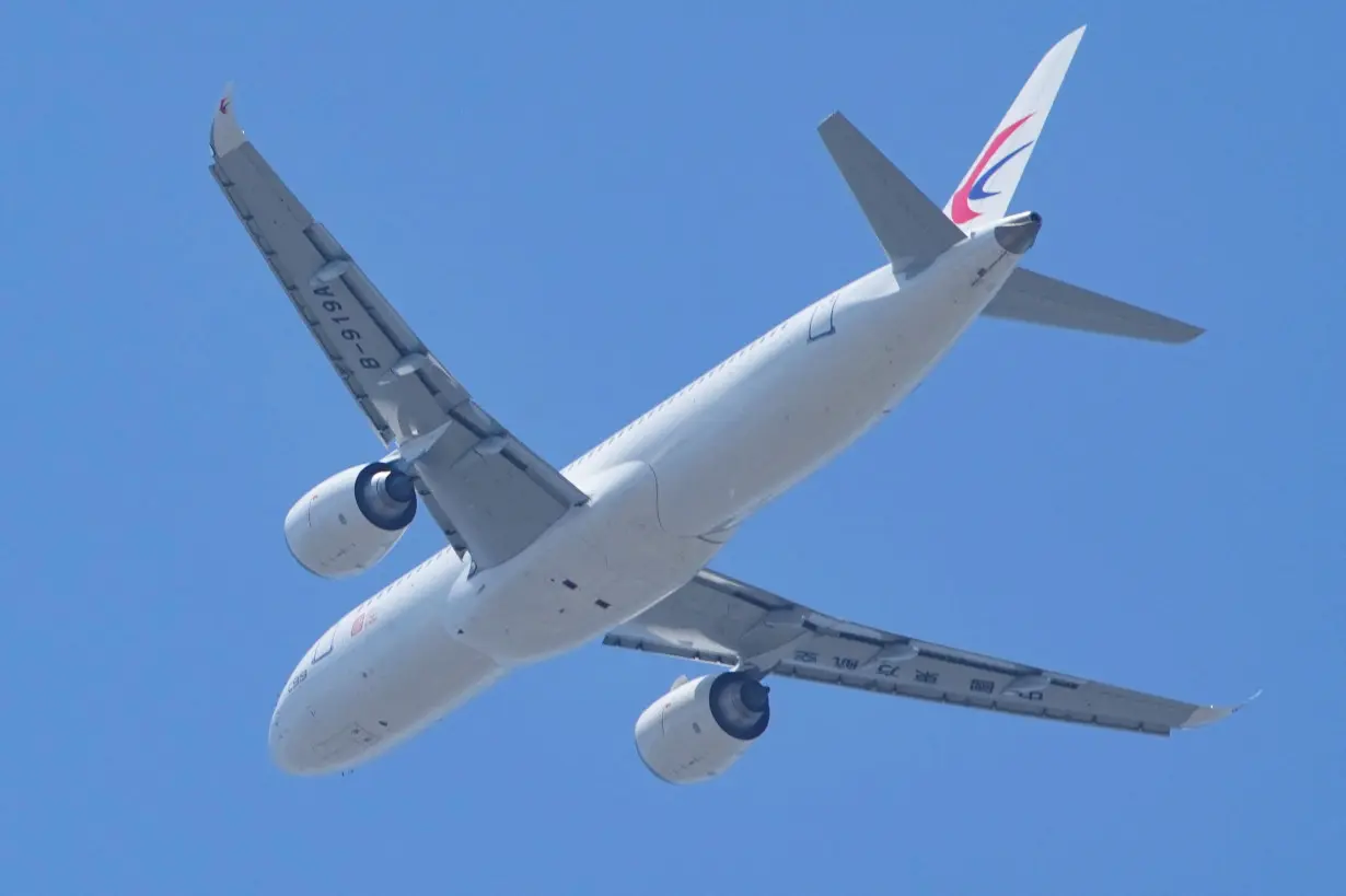 FILE PHOTO: China's domestically built C919 plane makes maiden commercial flight in Shanghai