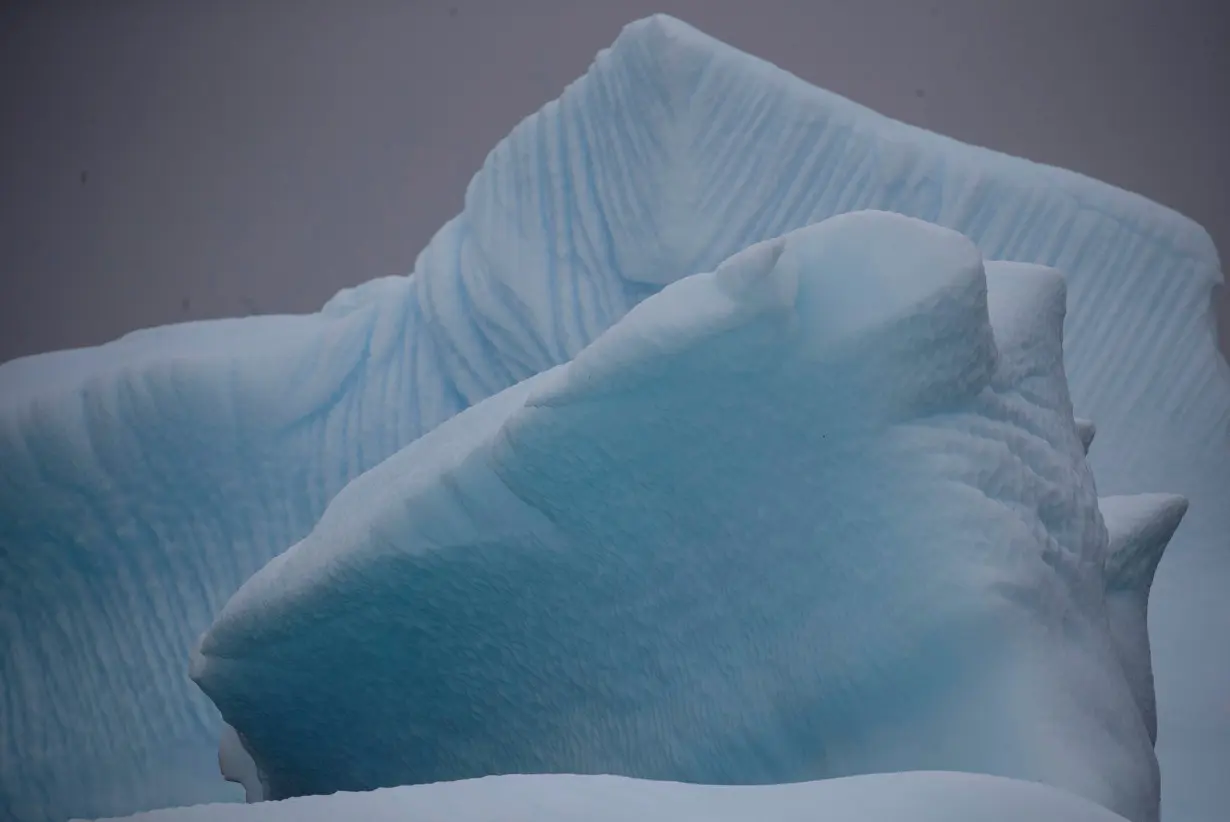 FILE PHOTO: An iceberg floats near Two Hummock Island, Antarctica