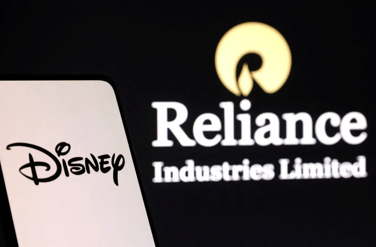 FILE PHOTO: Illustration shows Disney and Reliance logos