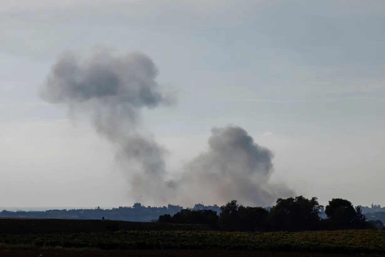 Smoke rises after an explosion in Gaza, seen from the Israel-Gaza border