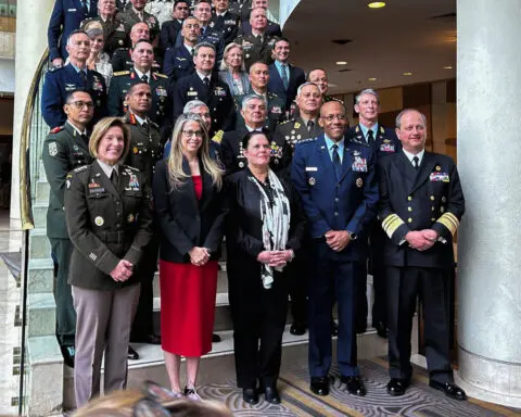 US general, pointing to Maduro, says democracy is under attack globally