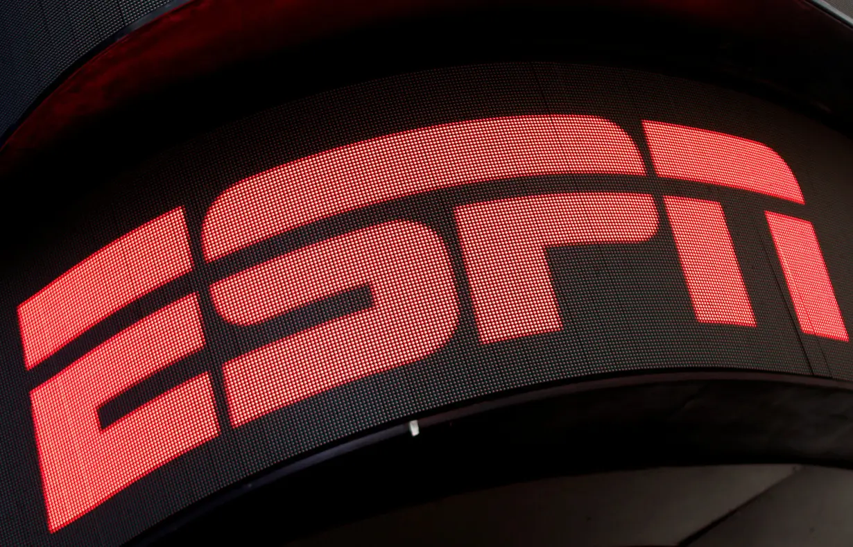 The ESPN logo is seen on an electronic display in Times Square in New York City