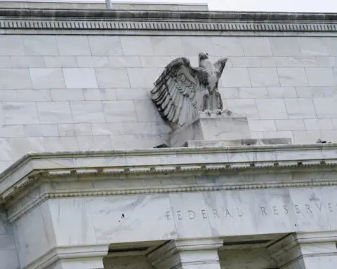 US Fed sets large bank capital levels after stress tests, eases on Goldman's level